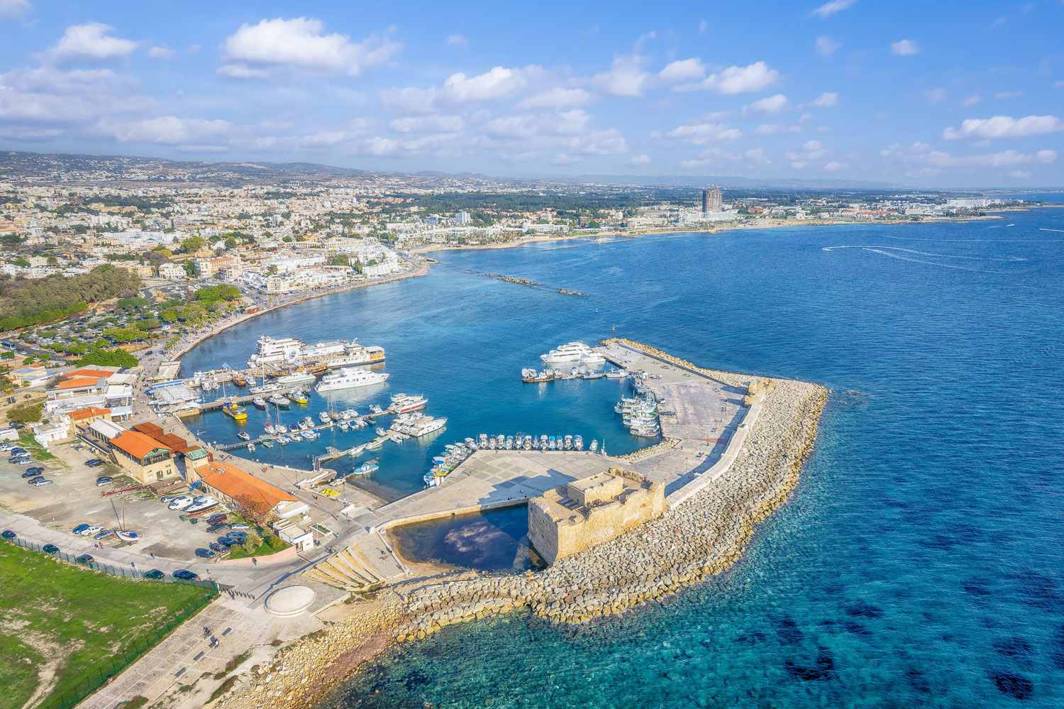 Picturesque Latchi Harbour with fishing boats and seafood restaurants, gateway to Blue Lagoon