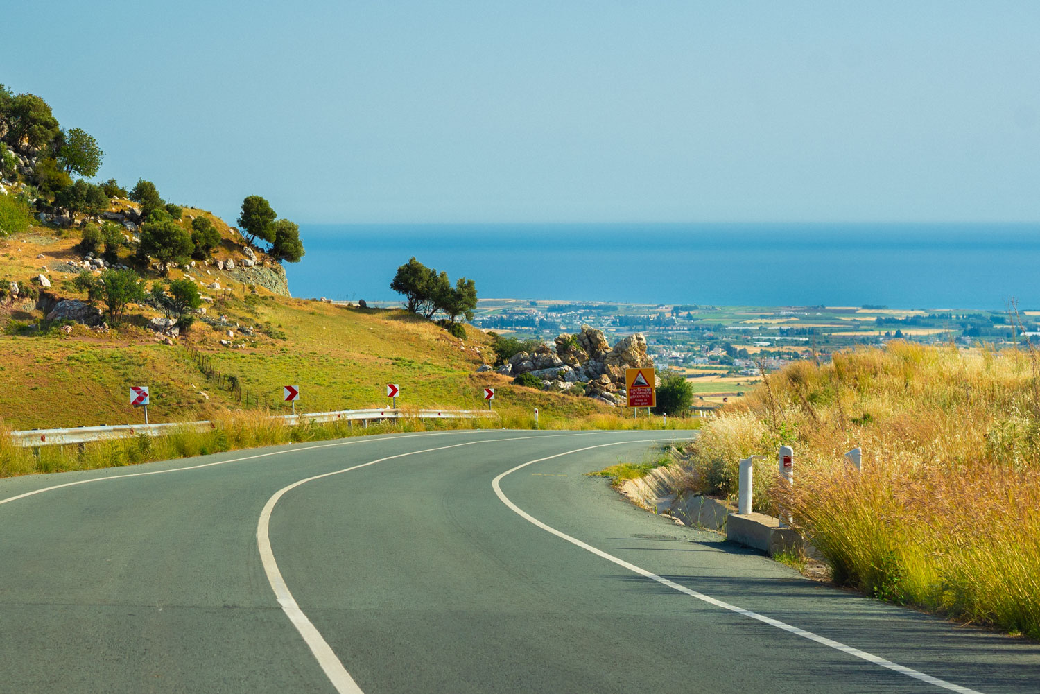 Scenic coastal highway overlooking Paphos, Cyprus with Mediterranean Sea views